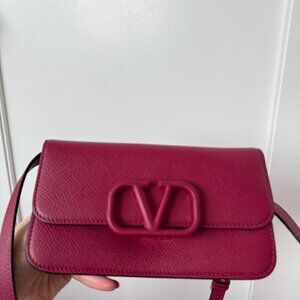 Valentino Garavani VSling Belt Bag In Raspberry Grained Calfskin Leather